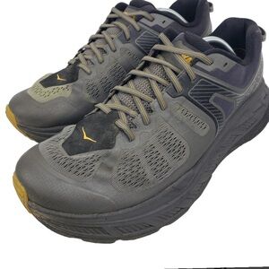 Hoka Black and Gray Athletic Shoes with Yellow Highlights Hoka Stinson atr 5